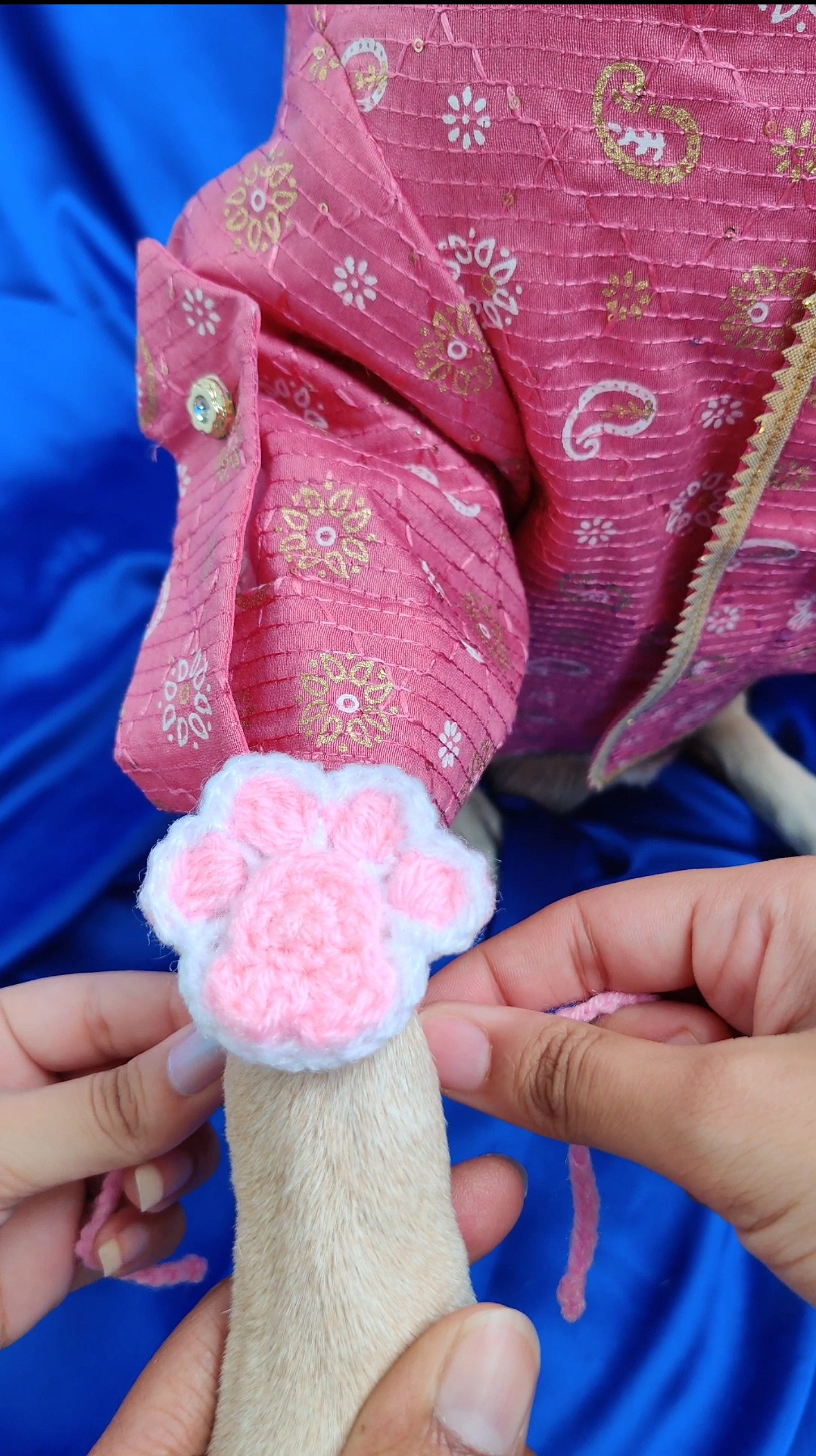 Crochet pink paw Rakhi